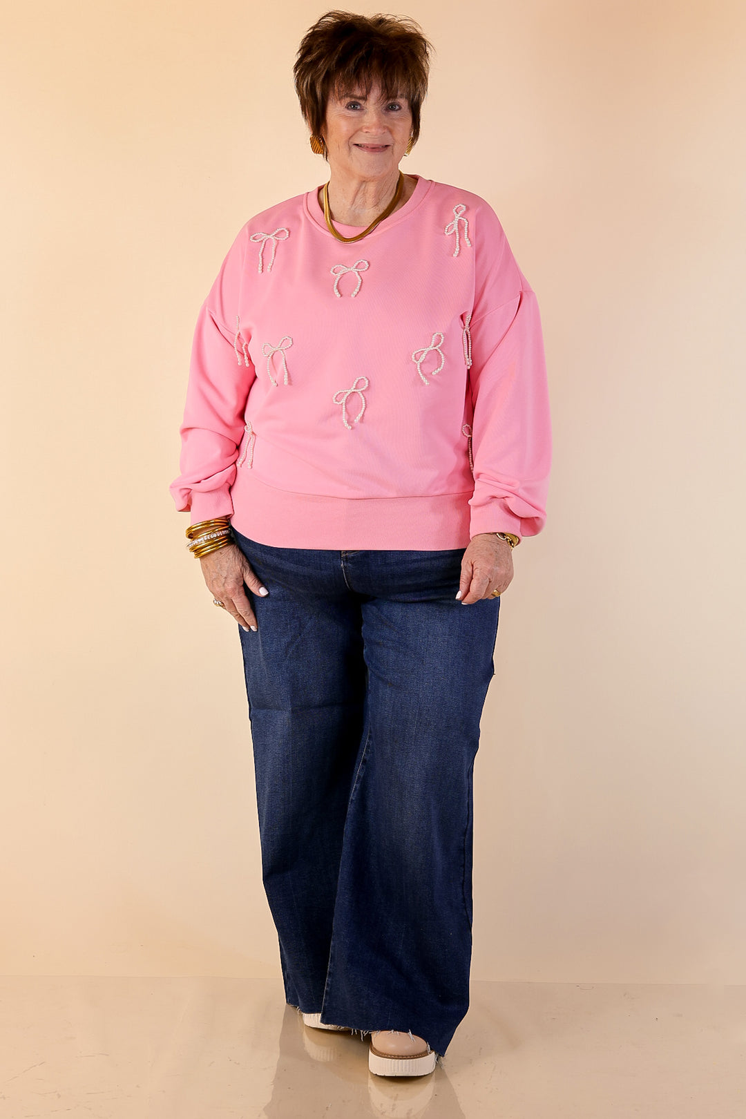 All Tied Up Pearl Bow Detail Long Sleeve Top with Scattered Bow Accents in Pink