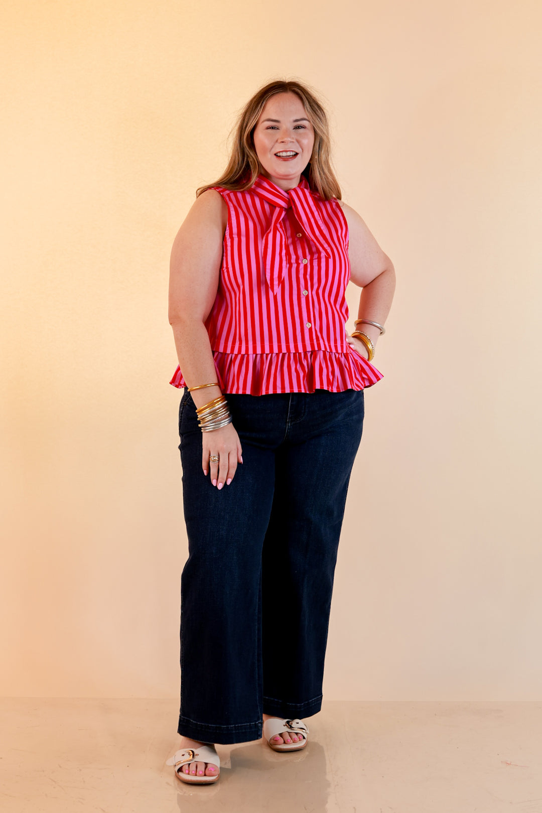 Sweet with Sass Stripe Sleeveless Tie Neck Top with Ruffle Hem in Pink and Red