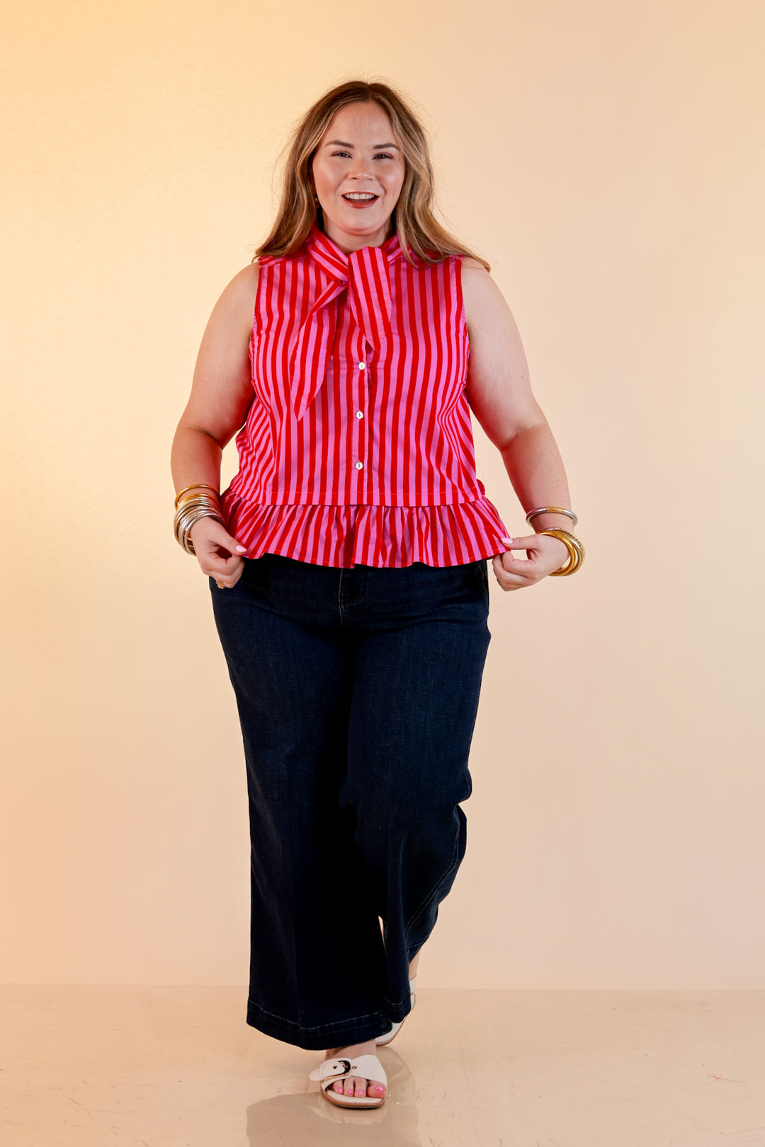 Sweet with Sass Stripe Sleeveless Tie Neck Top with Ruffle Hem in Pink and Red