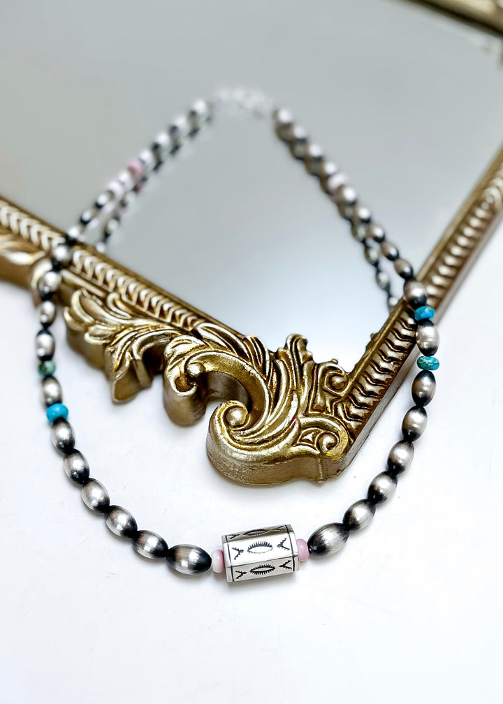 Navajo pearl necklace with turquoise and pink conch beads and stamped barrel bead, 17 inch sterling silver necklace