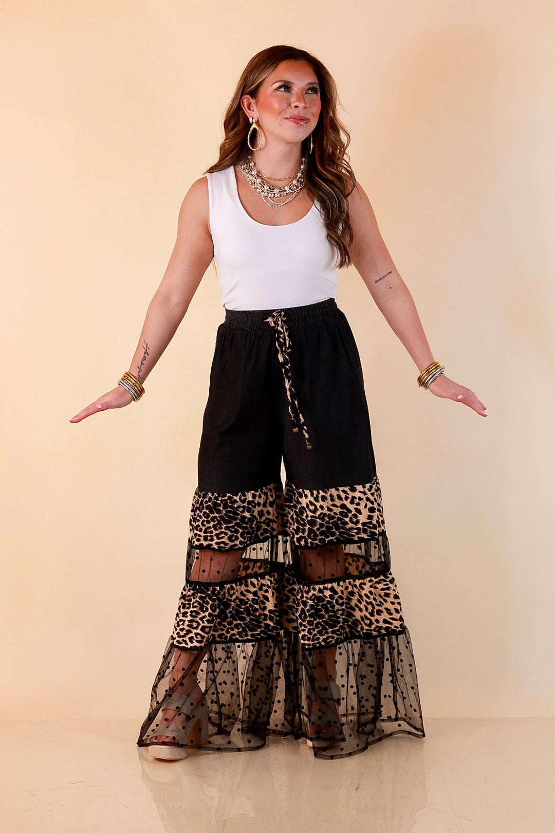 Call of the Wild leopard print tiered wide leg pants with sheer polka dot mesh in black