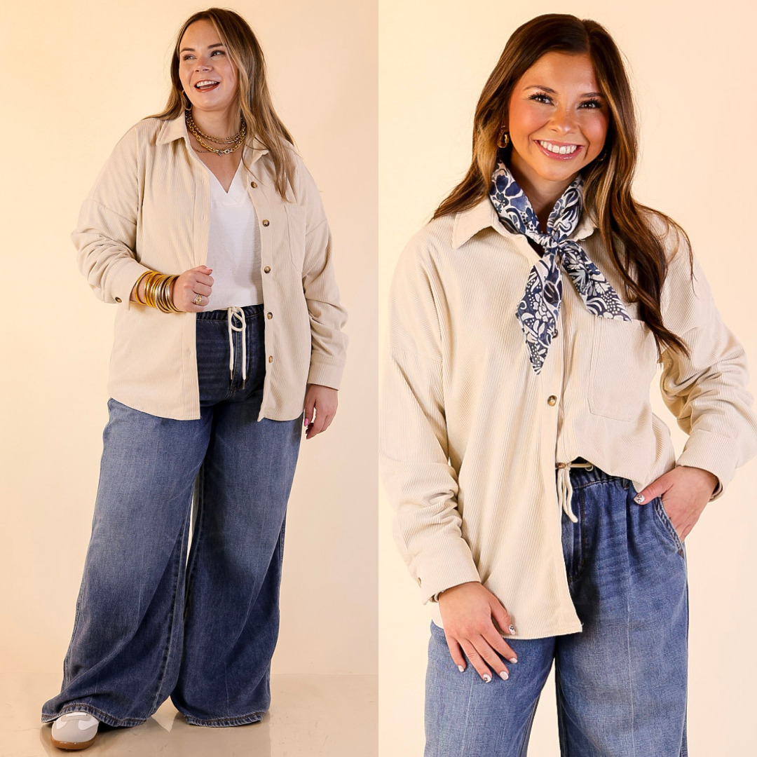 Models are wearing a corduroy shacket in cream and blue jeans with a beige background