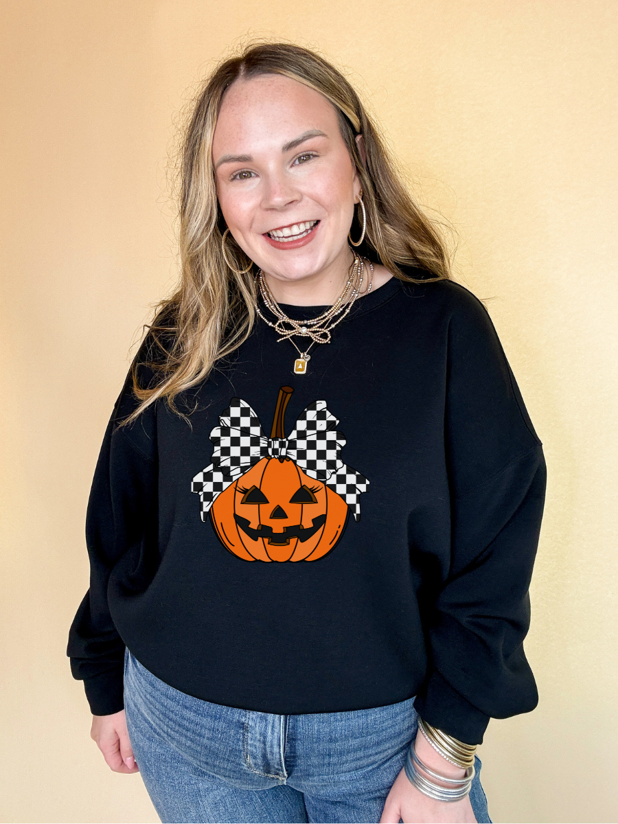 Online Exclusive | Jack-O-Lantern Pumpkin with Checkered Bow Graphic Sweatshirt in Multiple Color Options