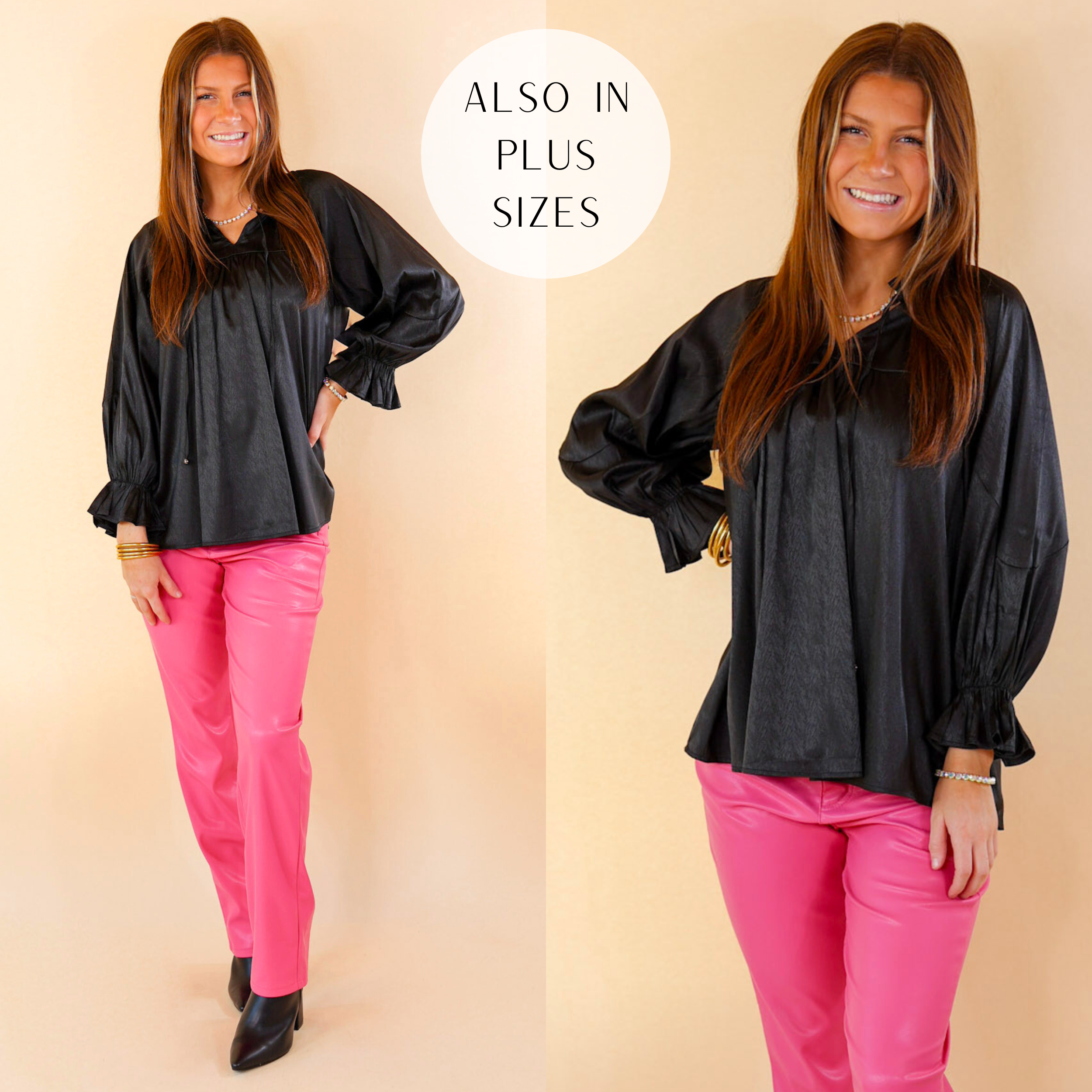 Model is wearing black long sleeve blouse. Model has paired this with pink pants, black booties, and silver jewelry. 