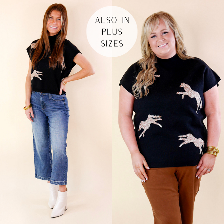 Models are wearing a black sweater top with cheetahs printed in it. Models have paired the top with jeans, booties, and gold tone jewelry. 
