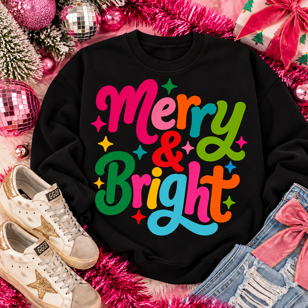 Colorful Merry and Bright Script Christmas graphic tee or sweatshirt on black with rainbow Merry and Bright script with sparkle accents
