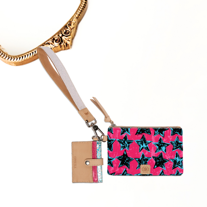 Wristlet with star pattern and beige strap on a white background