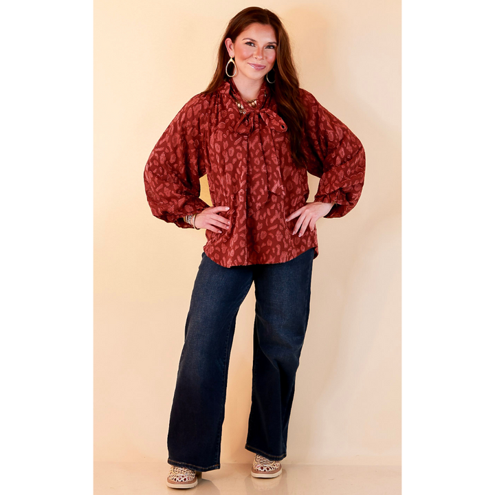 Commanding Attention Tie Neck Velvet Animal Print Balloon Sleeve Blouse in Burgundy