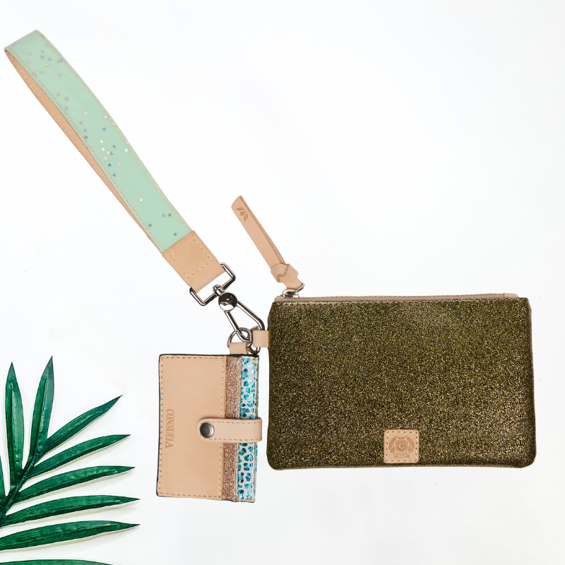 Green glittery pouch with beige strap and card holder on a white background