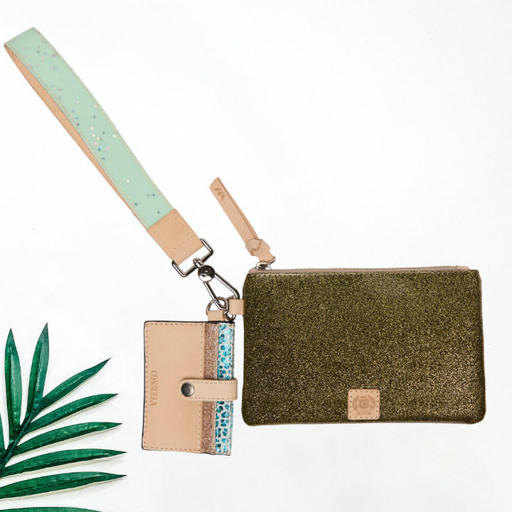 Green glittery pouch with beige strap and card holder on a white background