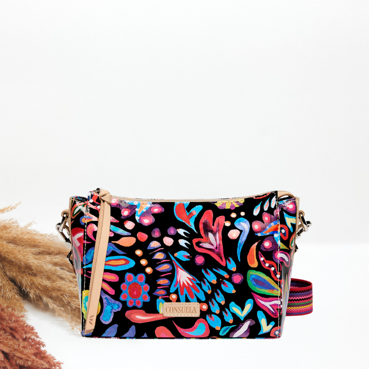 Colorful patterned handbag on a white background
