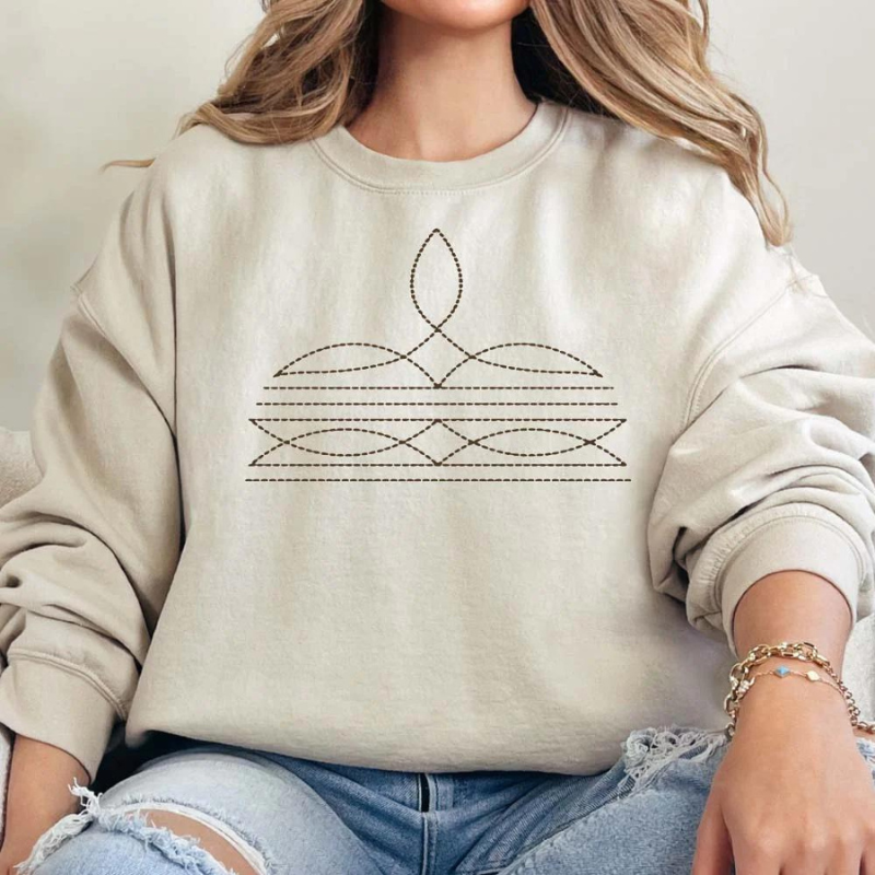 Online Exclusive | Boot Stitch Printed Long Sleeve Graphic Sweatshirt in Cream - Giddy Up Glamour Boutique