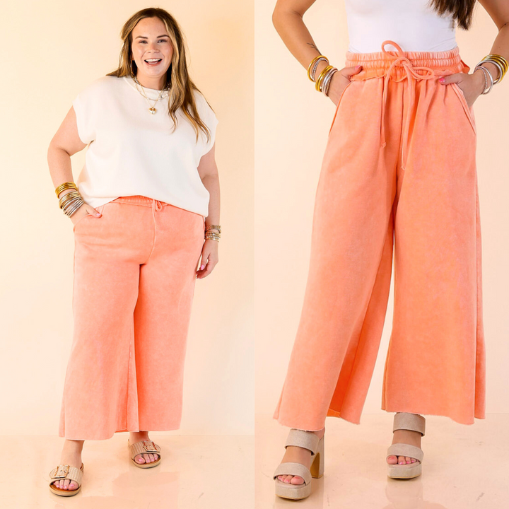 Cropped, cozy, and cool with distressed edges and a comfy drawstring waist—your new go-to sweatpants. Sizes small through large.