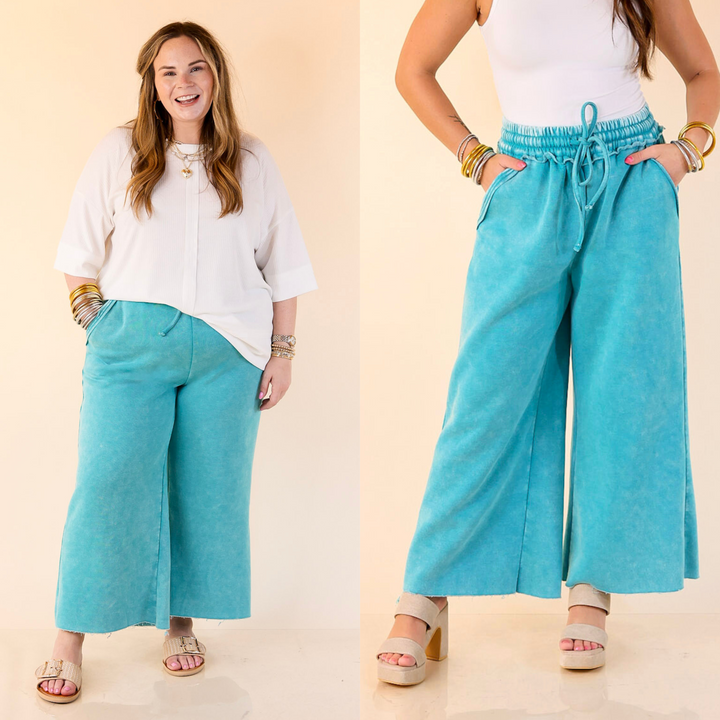 Cropped, cozy, and cool with distressed edges and a comfy drawstring waist—your new go-to sweatpants. Sizes small through large.