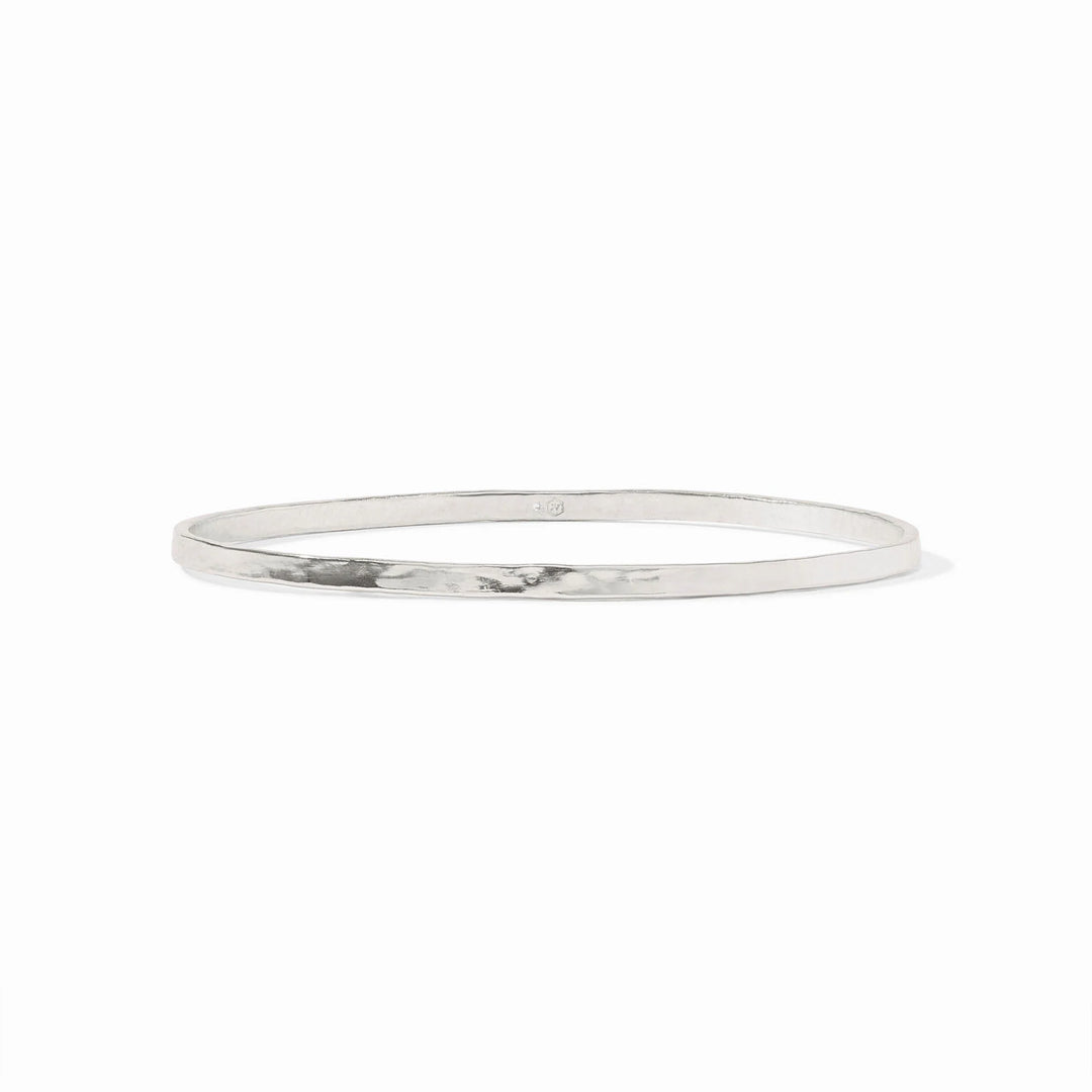 Silver bangle on a white background