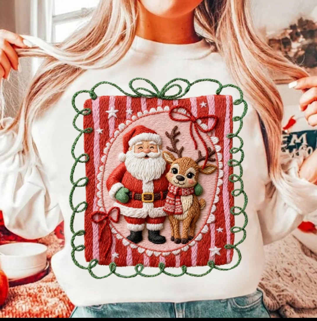 Faux Yarn Santa and Deer Christmas graphic tee or sweatshirt on white with Santa and a reindeer in a striped frame