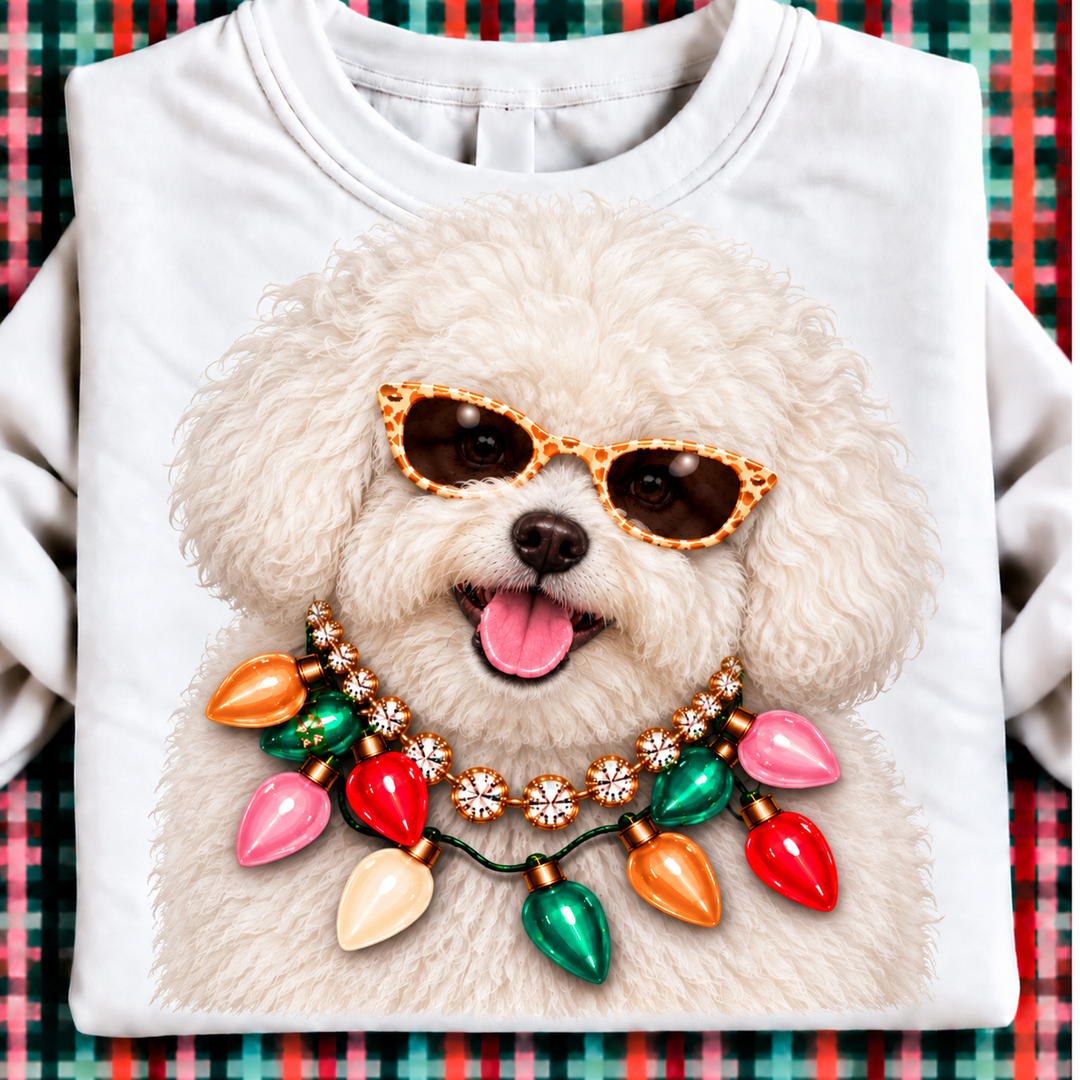 Holiday Boujee Bichon Christmas graphic tee or sweatshirt on white with a fluffy white Bichon Frise in sunglasses, a crystal necklace and Christmas lights