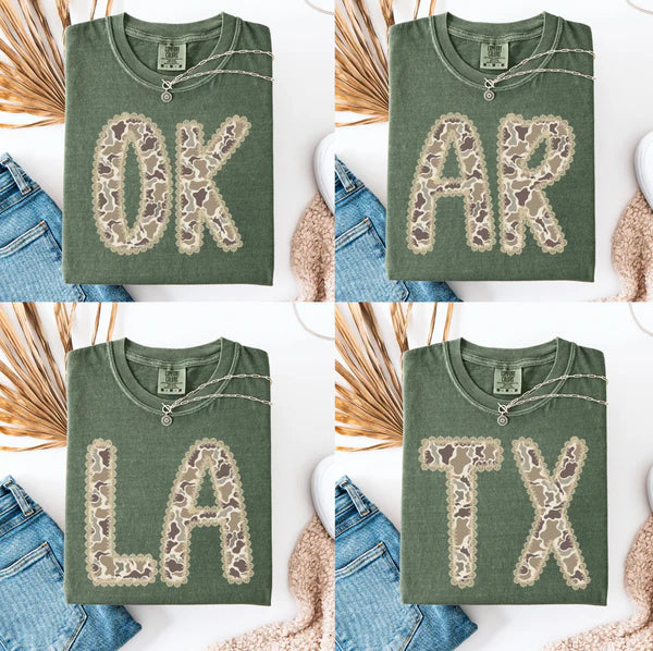 Four green shirts with lace lettering on a white background