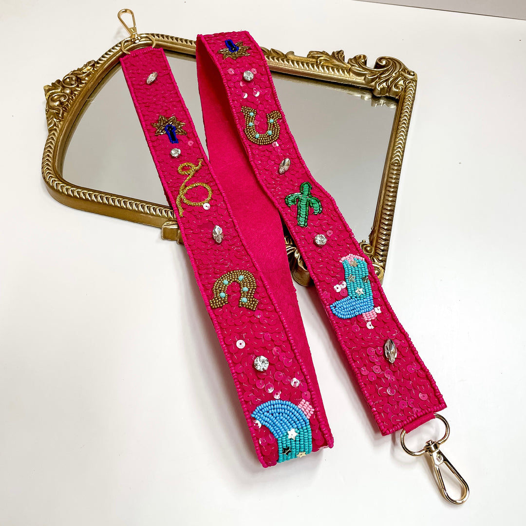 Pink strap with decorative elements on a white background