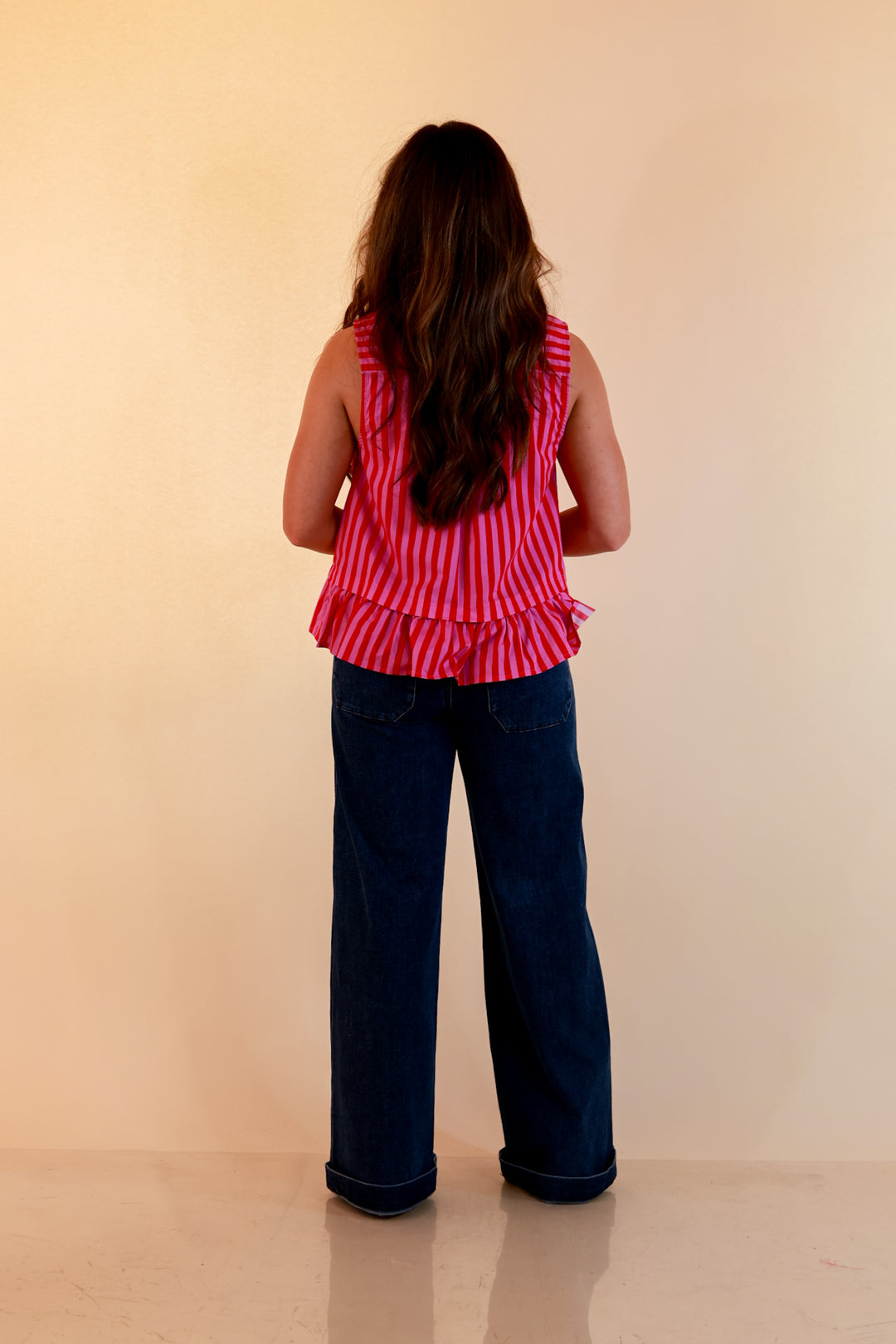 Sweet with Sass Stripe Sleeveless Tie Neck Top with Ruffle Hem in Pink and Red