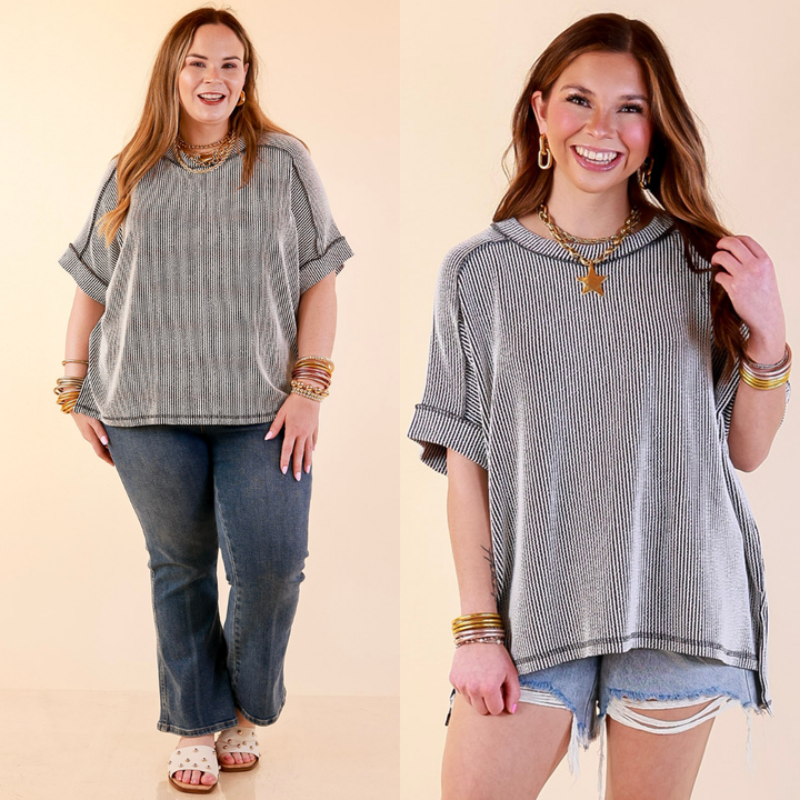 Models are wearing Daily Perfection Scoop Neck Short Sleeve Ribbed Top in Black and White Mix with bottoms against a beige backdrop.