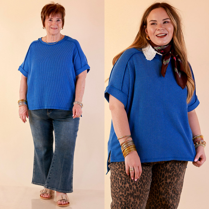 Models are wearing Daily Perfection Scoop Neck Short Sleeve Ribbed Top in Ocean Blue with bottoms against a beige backdrop.