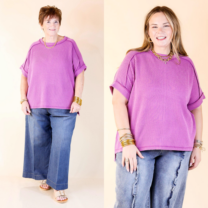 Designed with a flattering scoop-neck, ribbed texture, and short sleeves, this versatile tee is perfect for any occasion. Sizes S/M through 2X/3X.