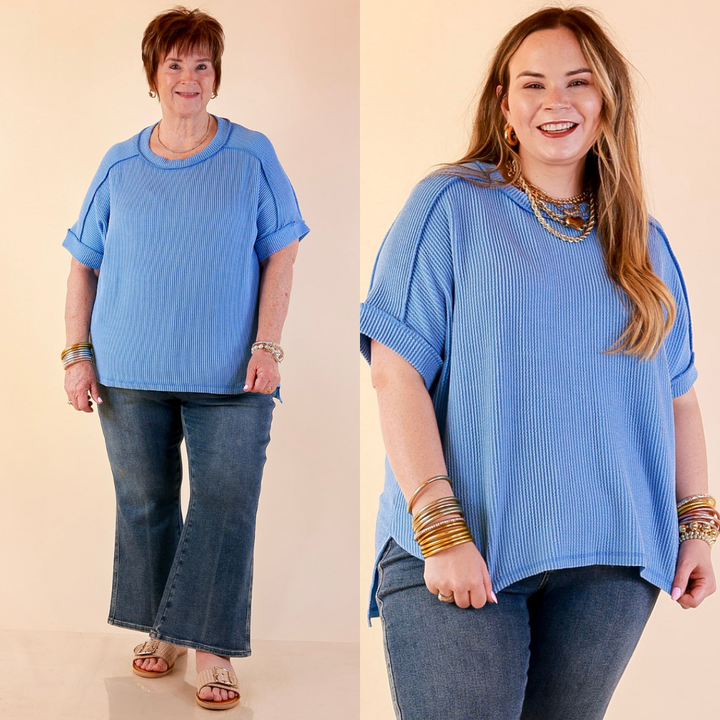Models are wearing Daily Perfection Scoop Neck Short Sleeve Ribbed Top in Sky Blue with bottoms against a beige backdrop.