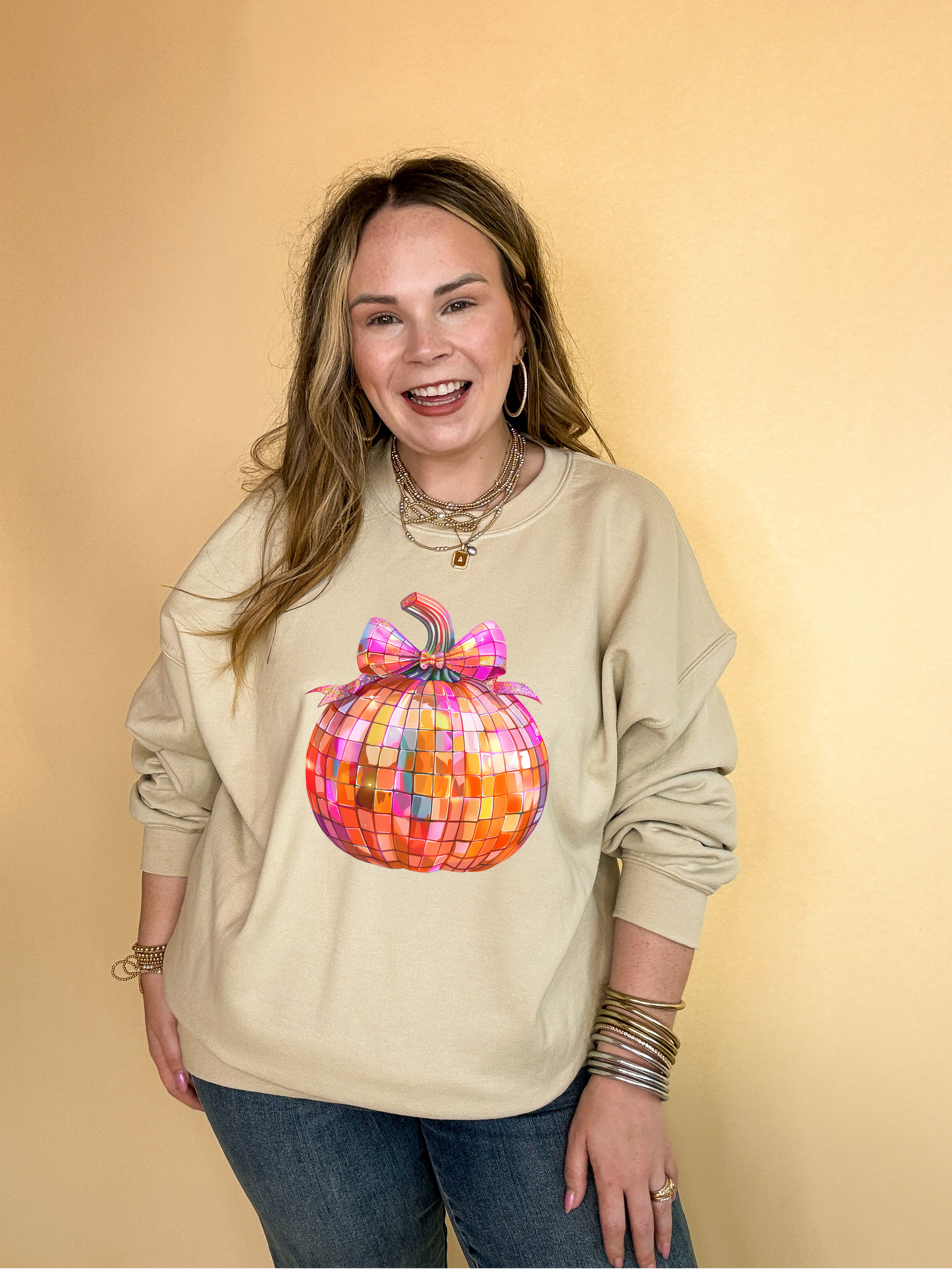 Online Exclusive | Disco Multi Colored Pumpkin with Bow Graphic Sweatshirt in Multiple Color Options