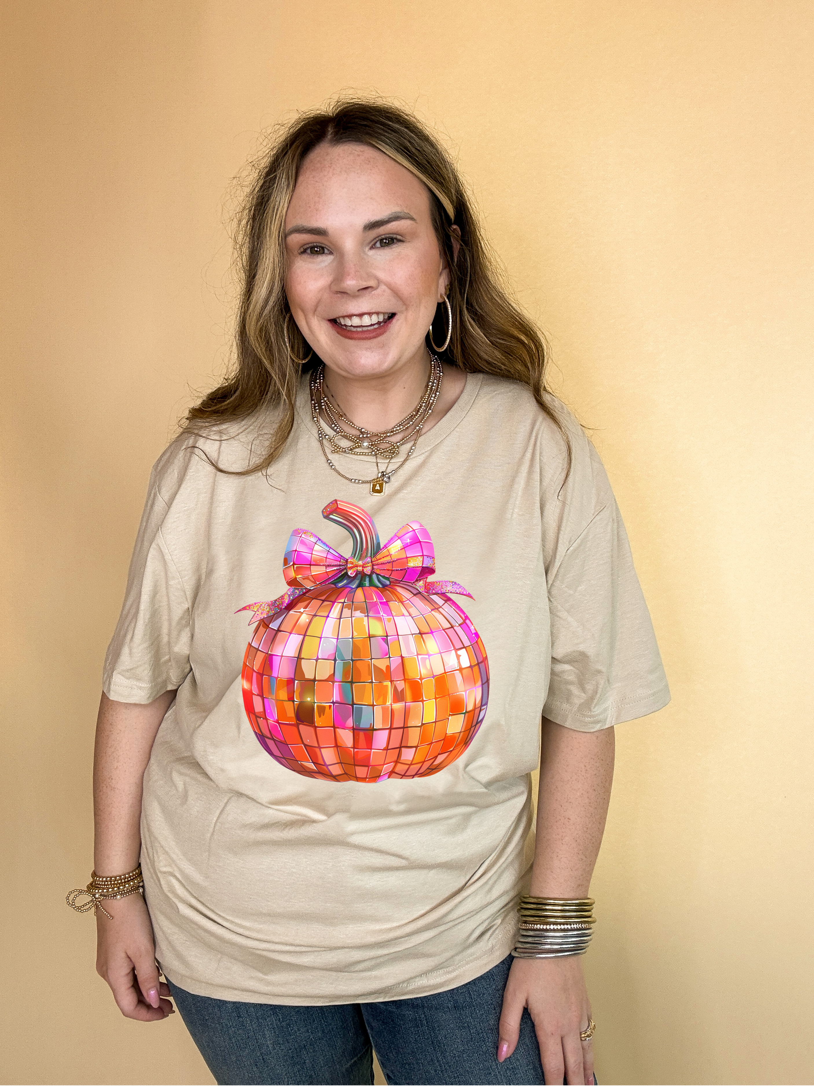 Online Exclusive | Disco Multi Colored Pumpkin with Bow Graphic Tee in Multiple Color Options