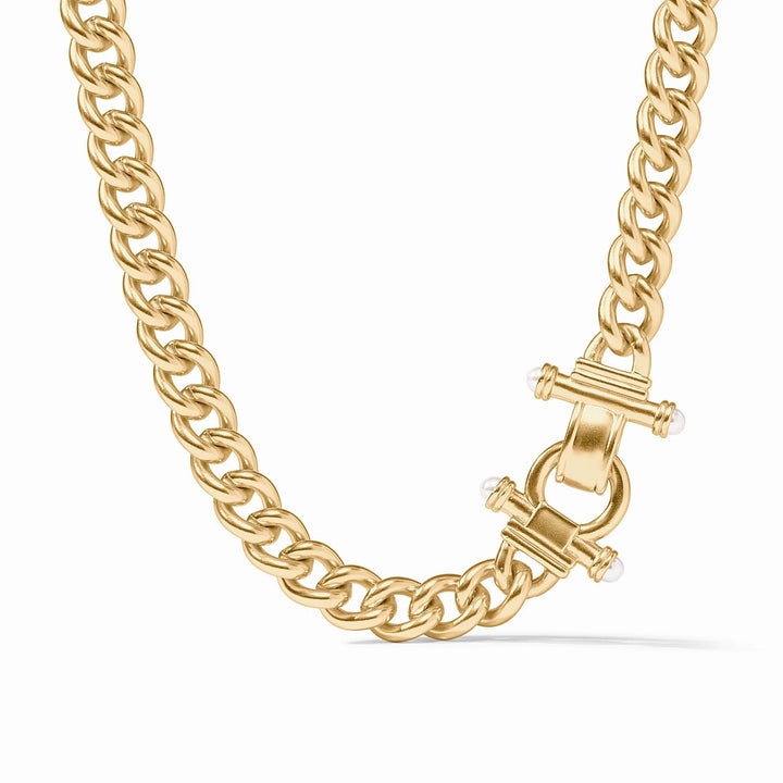 Gold chain necklace with a clasp on a white background