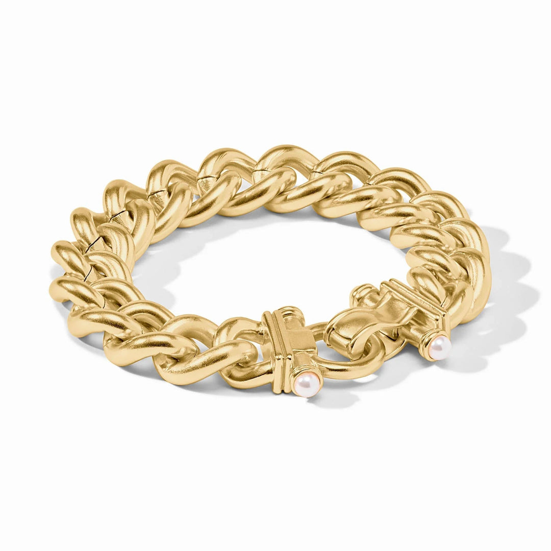 Gold chain bracelet with a clasp on a white background