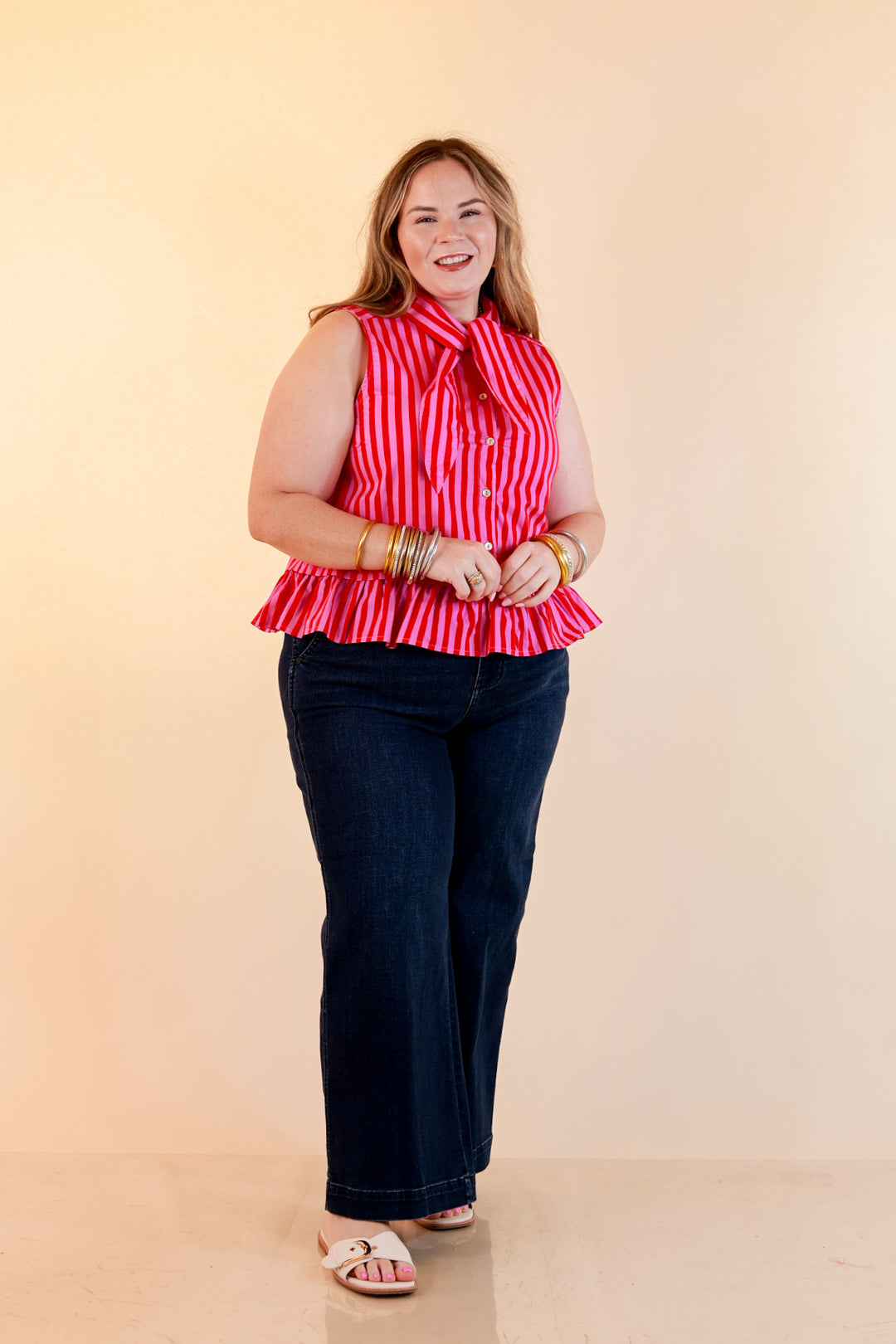 Sweet with Sass Stripe Sleeveless Tie Neck Top with Ruffle Hem in Pink and Red