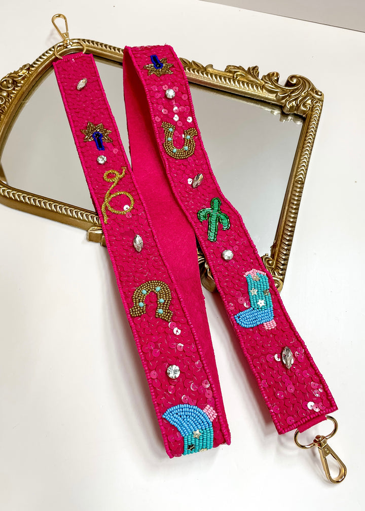 Pink strap with decorative elements on a white background