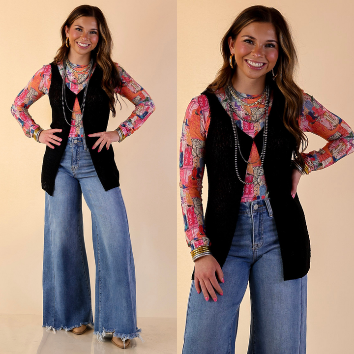 Model is wearing Textured Knit Front Clasp Sweater Vest in Black with Jeans against a beige backdrop.