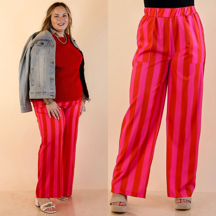 Models are wearing Elastic Waist Wide Leg Stripe Pants with Pockets in Pink and Red against a beige backdrop. 