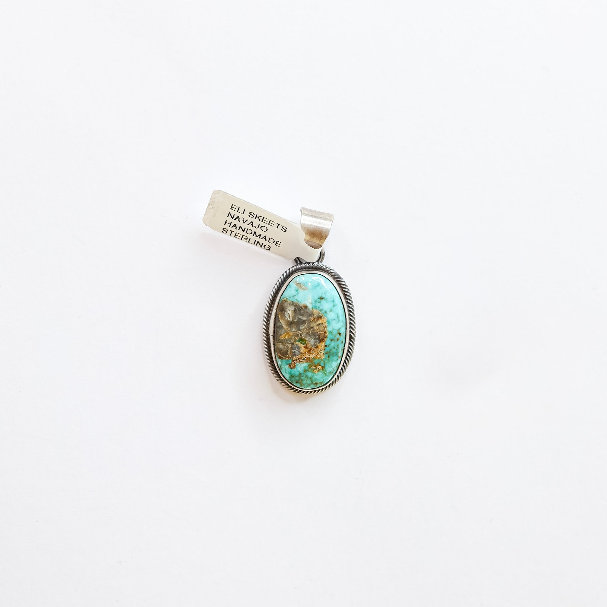 Eli Skeets | Navajo Handmade Sterling Silver Oval Pendant with Genuine Royston Turquoise Stone