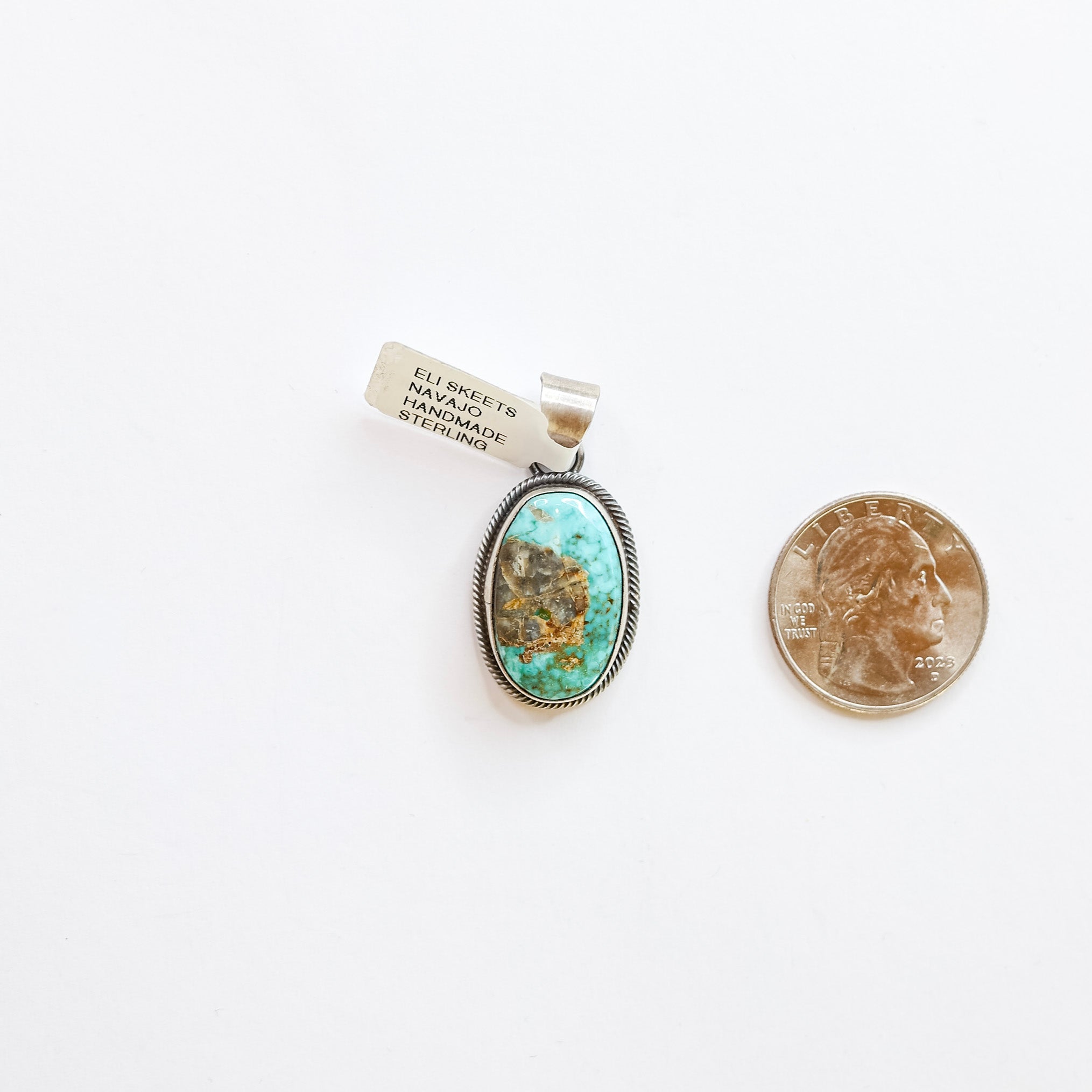 Eli Skeets | Navajo Handmade Sterling Silver Oval Pendant with Genuine Royston Turquoise Stone