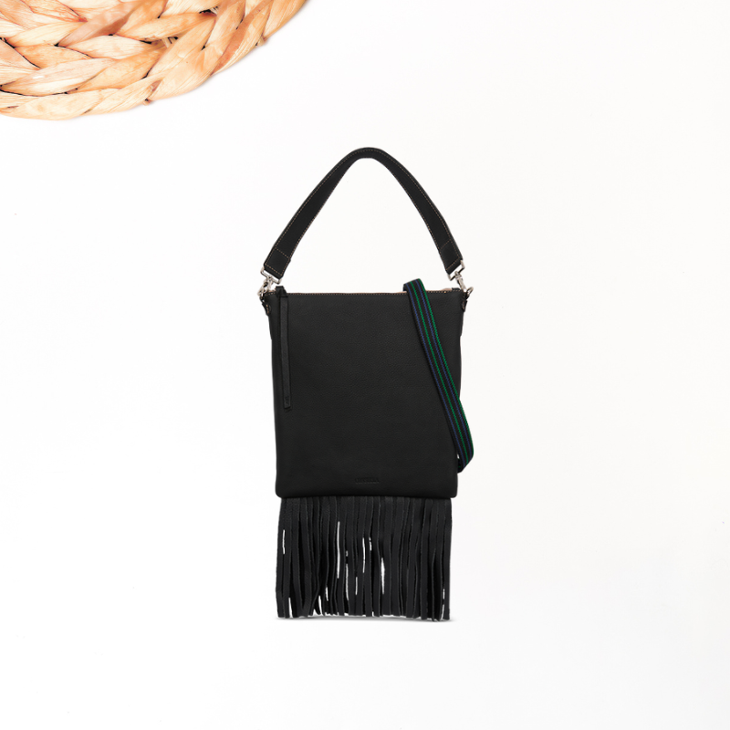 Black handbag with fringes on a white background