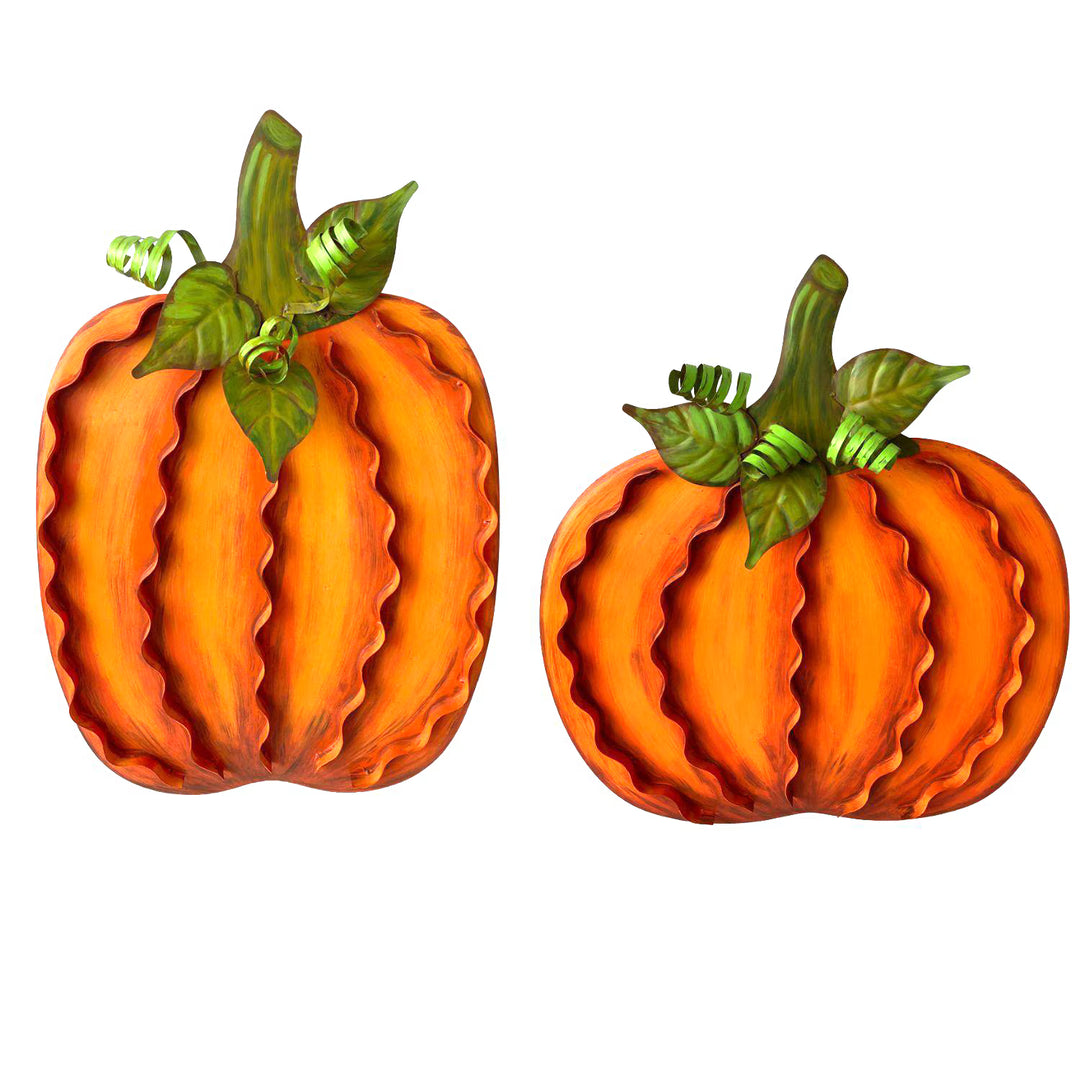 Two decorative pumpkins with green stems on a white background