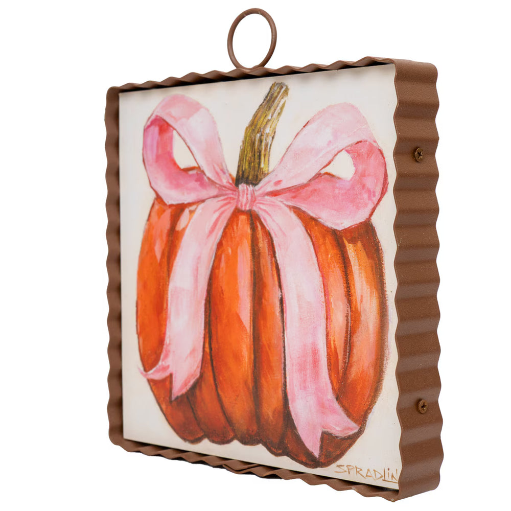 Side view of Pink Ribbon Pumpkin Mini Art Gallery by Roxanne Spradlin featuring orange pumpkin artwork, pink bow and scalloped metal frame.