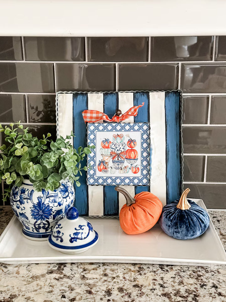 Blue Pumpkin Topiary Mini Gallery Art by Rosanne Beck displayed with blue and white chinoiserie pottery, greenery and velvet pumpkins.
