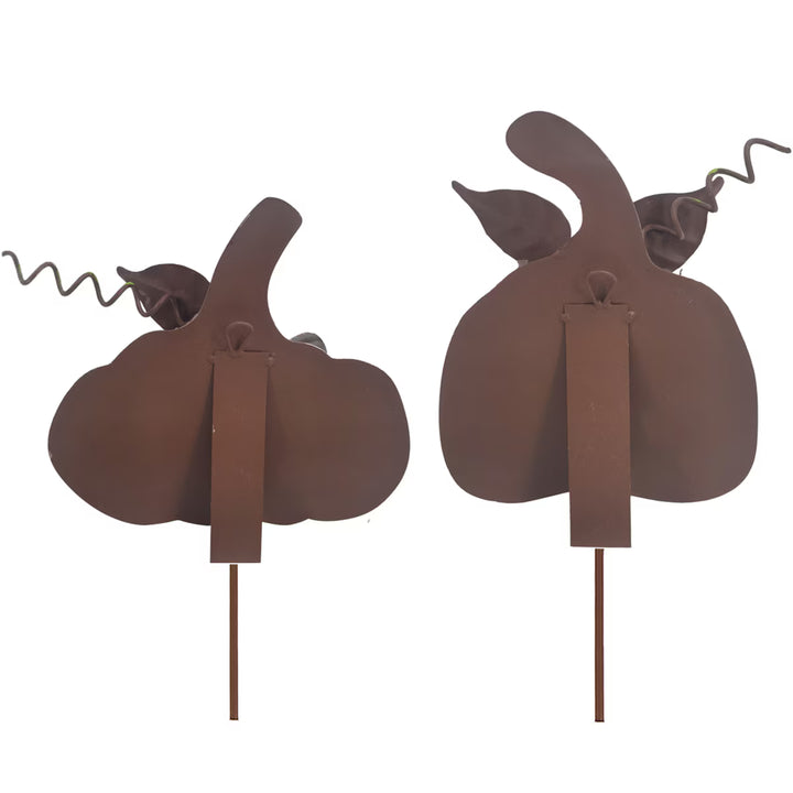 Back view of two Round Top Collection Cream Ribbon Pumpkins showing built-in easels, hanging loops and garden stake attachments.