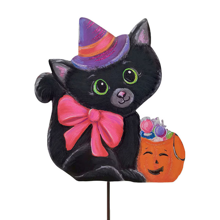 The Round Top Collection Sweet Kitty Witch metal Halloween decoration featuring a black cat, purple witch hat, pink bow and orange trick-or-treat bucket.