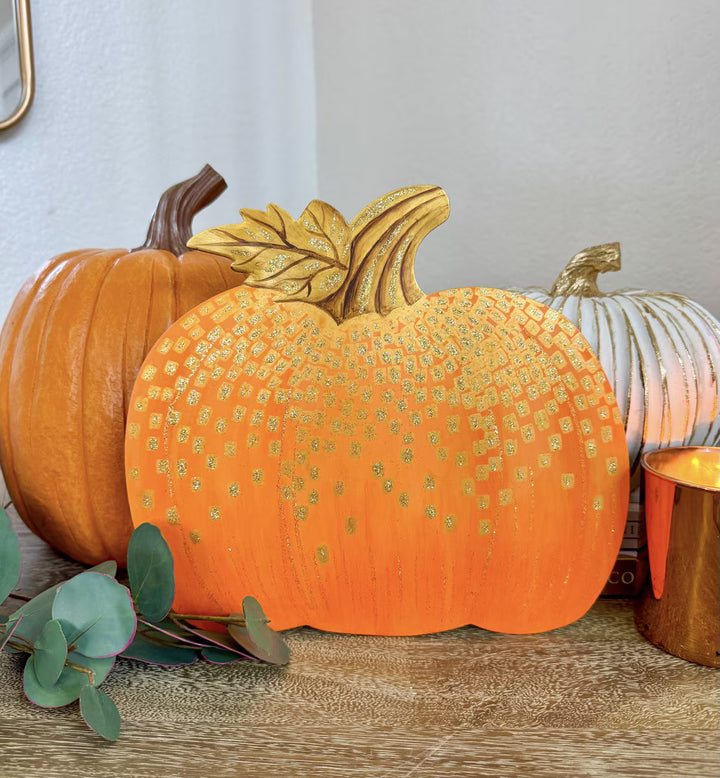 Round Top Collection Gold and Orange Pumpkin featuring sparkling gold accents and dimensional stem styled with traditional fall pumpkins.