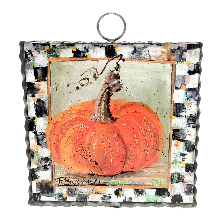 Decorative glass panel with a pumpkin design on a checkered background