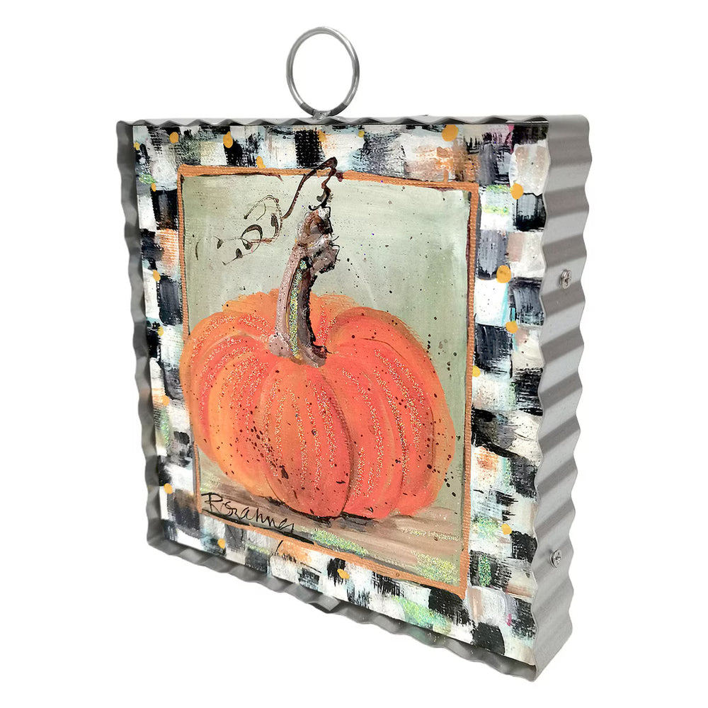 Decorative pumpkin ornament with a textured background