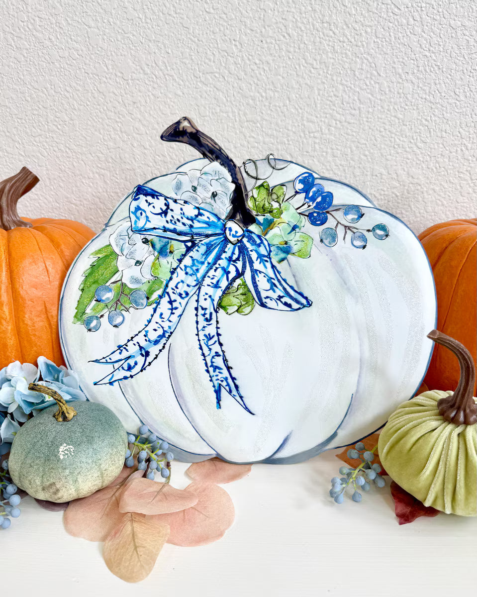 Rosanne Beck Autumn Hydrangea Pumpkin by The Round Top Collection styled with orange pumpkins, velvet pumpkins, blue hydrangeas and fall greenery.