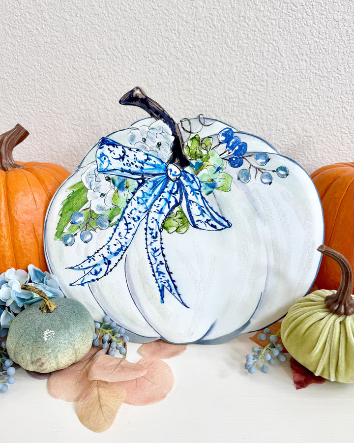 Rosanne Beck Autumn Hydrangea Pumpkin by The Round Top Collection styled with orange pumpkins, velvet pumpkins, blue hydrangeas and fall greenery.