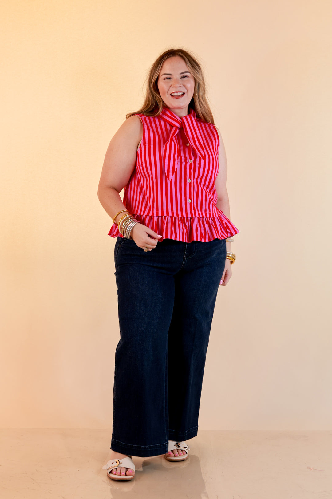 Sweet with Sass Stripe Sleeveless Tie Neck Top with Ruffle Hem in Pink and Red